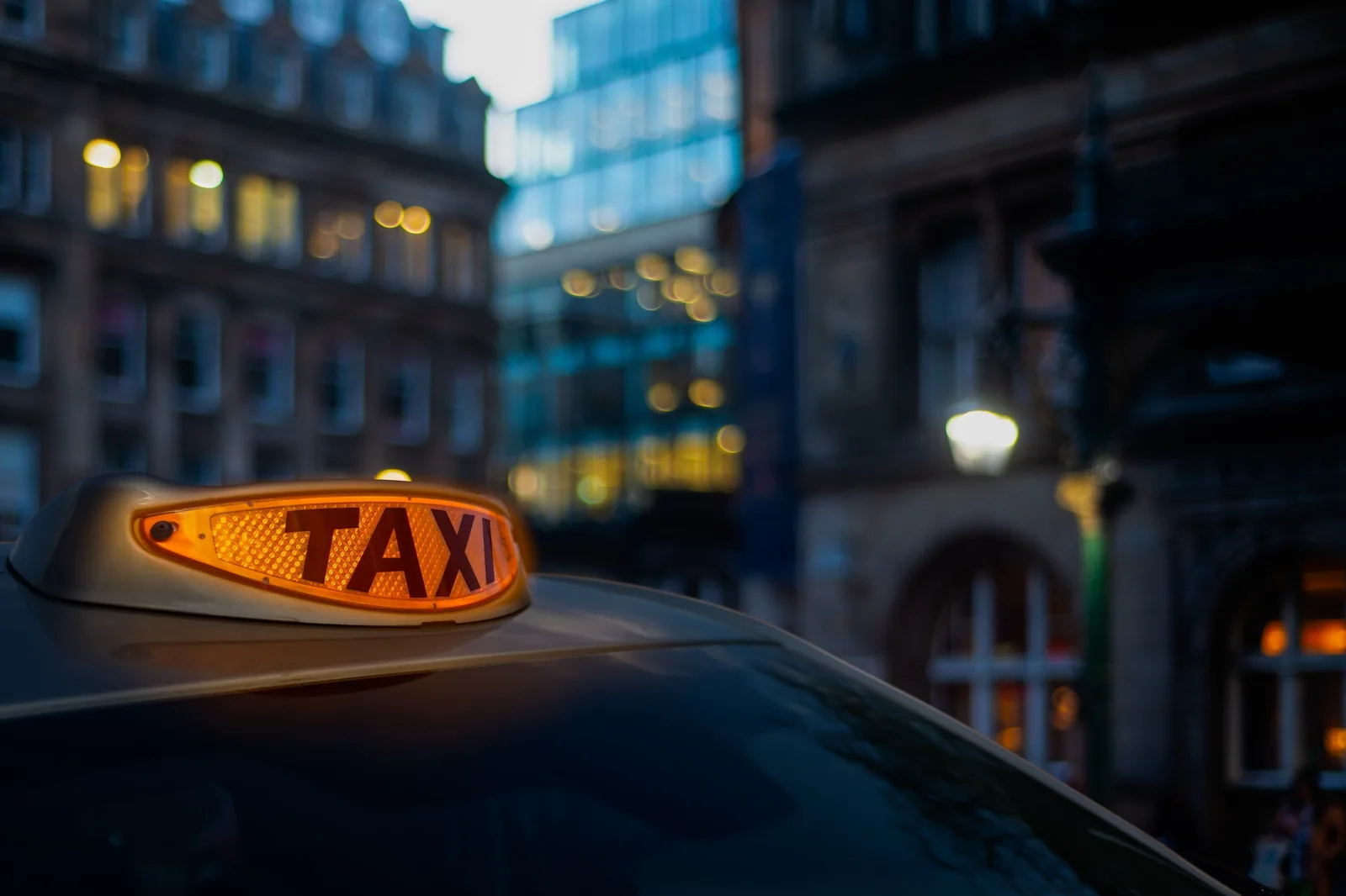 Taxi sign at night